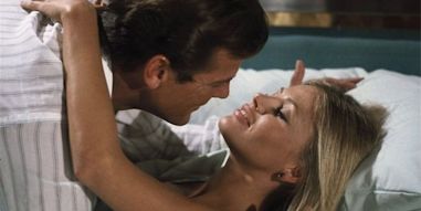 Roger Moore showing Britt Ekland his appreciation in The Man With The Golden Gun (1974)