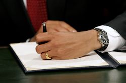 President Barack Obama signing legislation, the 7th left-handed US President.