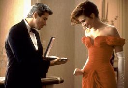 A prostitute retains her dignity by allowing the rich guy she's blowing to buy her lots of expensive clothing in Pretty Woman (1990).