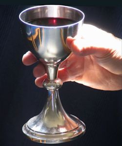 New Zealand Government reverses prison ban on communion wine.